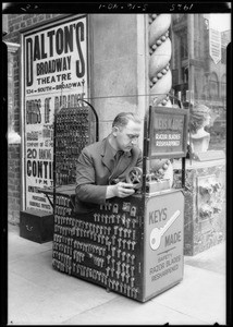 Armless and legless motorcycle rider and key maker, Southern California, 1925