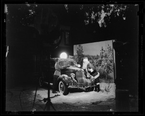 Shooting snow scene at studio, Ford and Santa Claus, Southern California, 1935