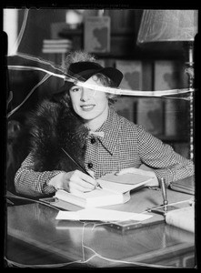 Anita Stewart in book department, Southern California, 1935