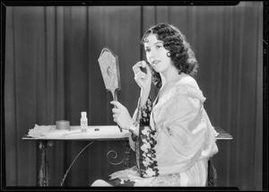 Toilet articles, girl in studio, Southern California, 1930