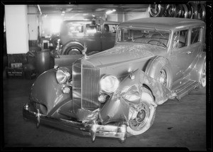 Intersection of Wilshire Boulevard and Malcolm Avenue and Packard sedan, Los Angeles, CA, 1935