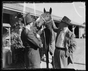 Sport suits at stable, Southern California, 1935