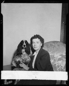 Mrs. Charles Levenberg and dog, Southern California, 1940