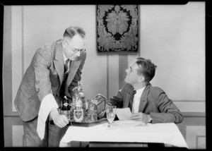 Jeffries & McKlean at table in studio, Southern California, 1929