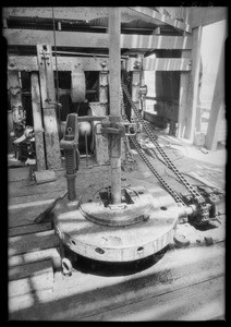 Go-around tongs at oil well, Southern California, 1926