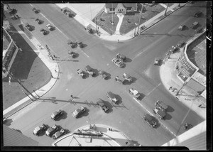 Traffic at intersection of South Western Avenue and Wilshire Boulevard from Pellissier Building, Los Angeles, CA, 1933