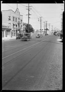 Wrecked truck and intersection near 9th Street and Stanford Avenue, Southern California, 1933