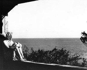 A woman looking out over the ocean