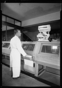 Paper cutter at Southwestern Butcher's Supply Company, 4917 Long Beach Avenue, Los Angeles, CA, 1935