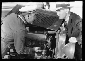 Customer watching lubrication of car, Southern California, 1931