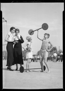 Miss Pyle, Miss Ashtor, and Albert Barker in Exposition Park, Los Angeles, CA, 1934