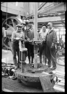 Go-around tongs in use in Torrance field, Torrance, CA, 1926