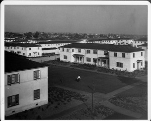 Wyvernwood Housing complex with 2-story units divided by greenbelt and walkways