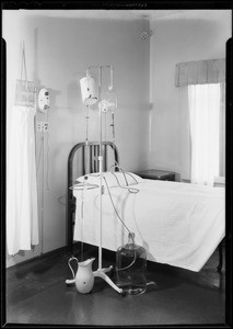 Douche arrangement beside bed, Los Angeles, CA, 1931