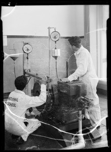 Students working on diesel motors, Southern California, 1935