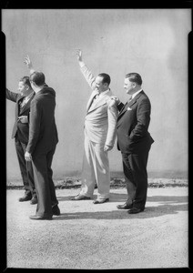 Executives welcoming ship in at harbor on roof of building, Southern California, 1932