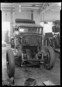 Wrecked Stutz car at Woodward Garage, Southern California, 1931