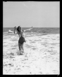 Girl in surf, Southern California, 1935