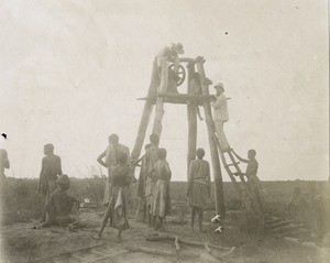 In Lealui, the missionaries Verdier and Mercier are setting up the new bell, a donation of Captain Alfred Bertrand