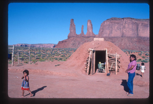 Navajo hogan family