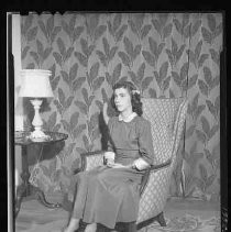 A young woman in a chair