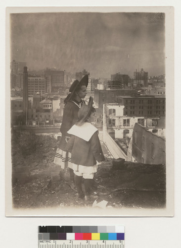 [Children watching fire from hill. Unidentified location.]