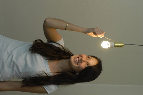 Lindsey Cromwell with CFL Light Bulb