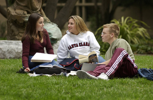 Students by St. Ignatius Statue