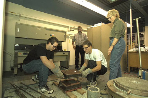 Engineering Lab students with robot