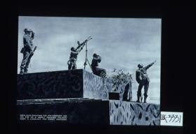 Bren gun mounted for anti-aircraft use on top of a newly designed pill-box keeps a look-out for enemy machines