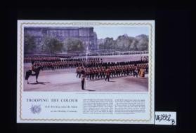 Against the plane trees of St. James's Park the ceremony gives a brilliant splash of colour to the London scene