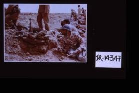 Poster depicting Iranian soldiers in trench