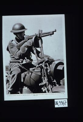 The fighting Scotsman, 1941. With kilt and bagpipes discarded, the modern Gordon Highlander is trained in the combined use of motor-cycle and tommy gun
