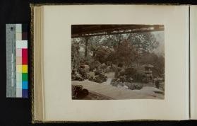 Photograph of a patio with a garden view
