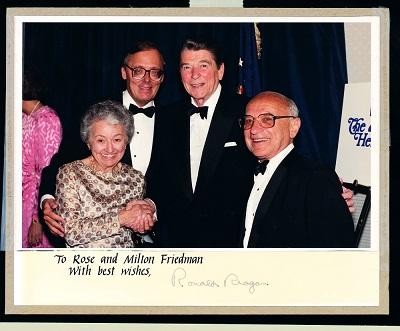 Photograph of Milton Friedman, Rose Friedman, Edwin Feulner, and Ronald Reagan