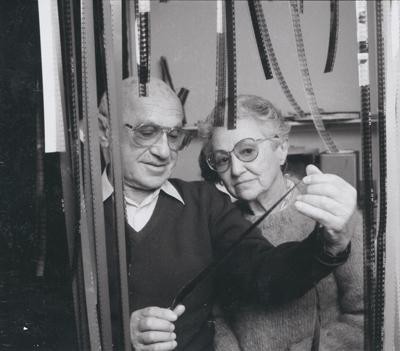 Photograph of Milton and Rose Friedman with motion picture film
