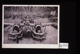 Building Blenheim bombers. Thousands of these machines are being produced by British factories
