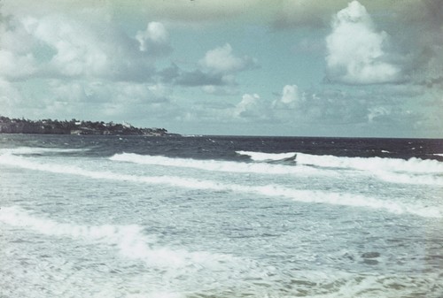 Frothy sea surf zone as seen on a December day just south of the Scripps pier looking towards La Jolla, California. December 1948