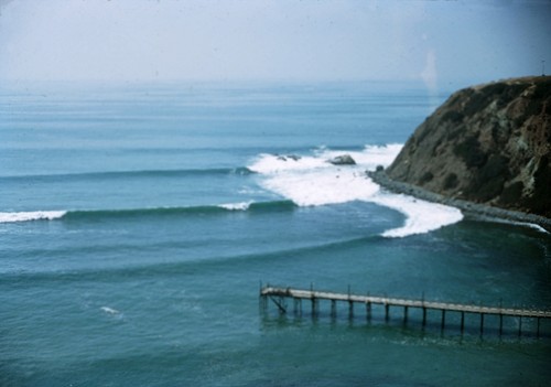 Southerly swell at Dana Point Cove, California. Waves are about 4-5' high with pier in foreground. August 15, 1949