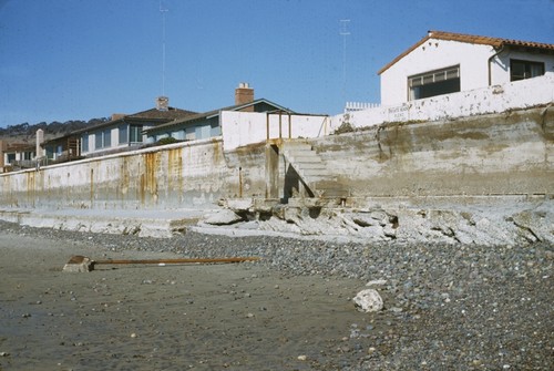 Sand erosion on seawall near Robert Dietz home, Spindrift Beach, La Jolla