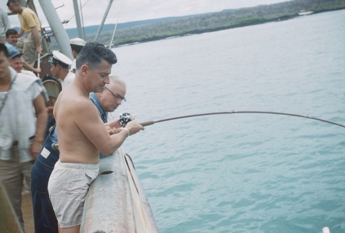 Lt. Cdmr. A.J. Bush, USGS, Strugges with a big one