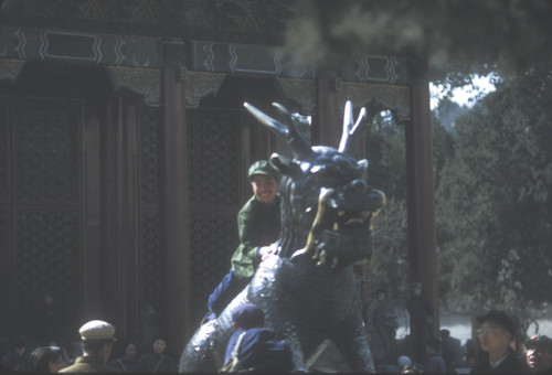 Child Climbing on a Statue at the Summer Palace