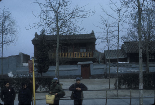 Waiting at a Bus Stop in Beijing