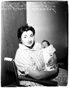 Polio mother gives birth to baby, 1958