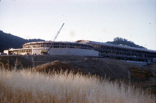 Administration Building under construction, circa 1960, at the Frank Lloyd Wright-designed Marin County Civic Center, San Rafael, California [photograph]