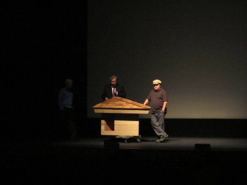 May, 2016 photograph of Jim Berger donating the doghouse he built, designed by Frank Lloyd Wright [photograph]