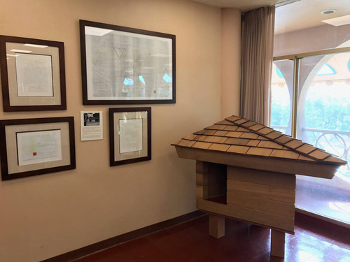Frank Lloyd Wright-designed doghouse on display at the Civic Center Library in San Rafael [digital photograph]