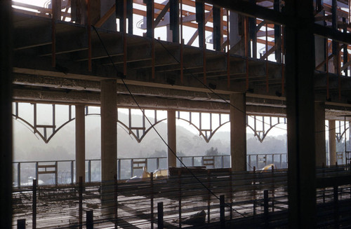 Administration Building construction, featuring the repeated arch shape, part of the Frank Lloyd Wright-designed Marin County Civic Center, San Rafael, California, circa 1960 [photograph]