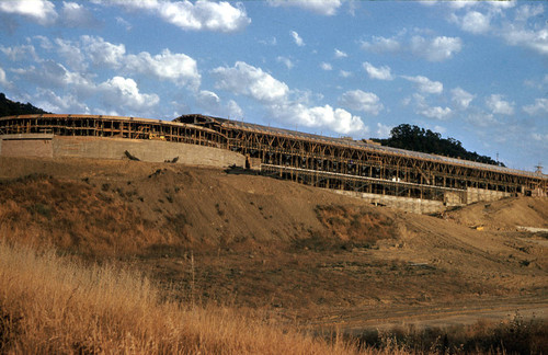 Exterior view of Administration Building construction, at the Frank Lloyd Wright-designed Marin County Civic Center, San Rafael, California, circa 1961 [photograph]