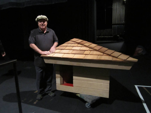 May, 2016 photograph of Jim Berger donating the doghouse he built, designed by Frank Lloyd Wright [photograph]
